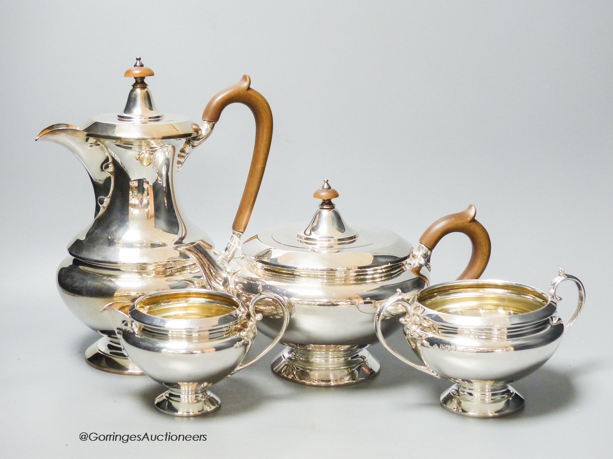 A George V silver four piece tea set, Jay, Richard Attenborough Co Ltd, London, 1912, gross 76oz.